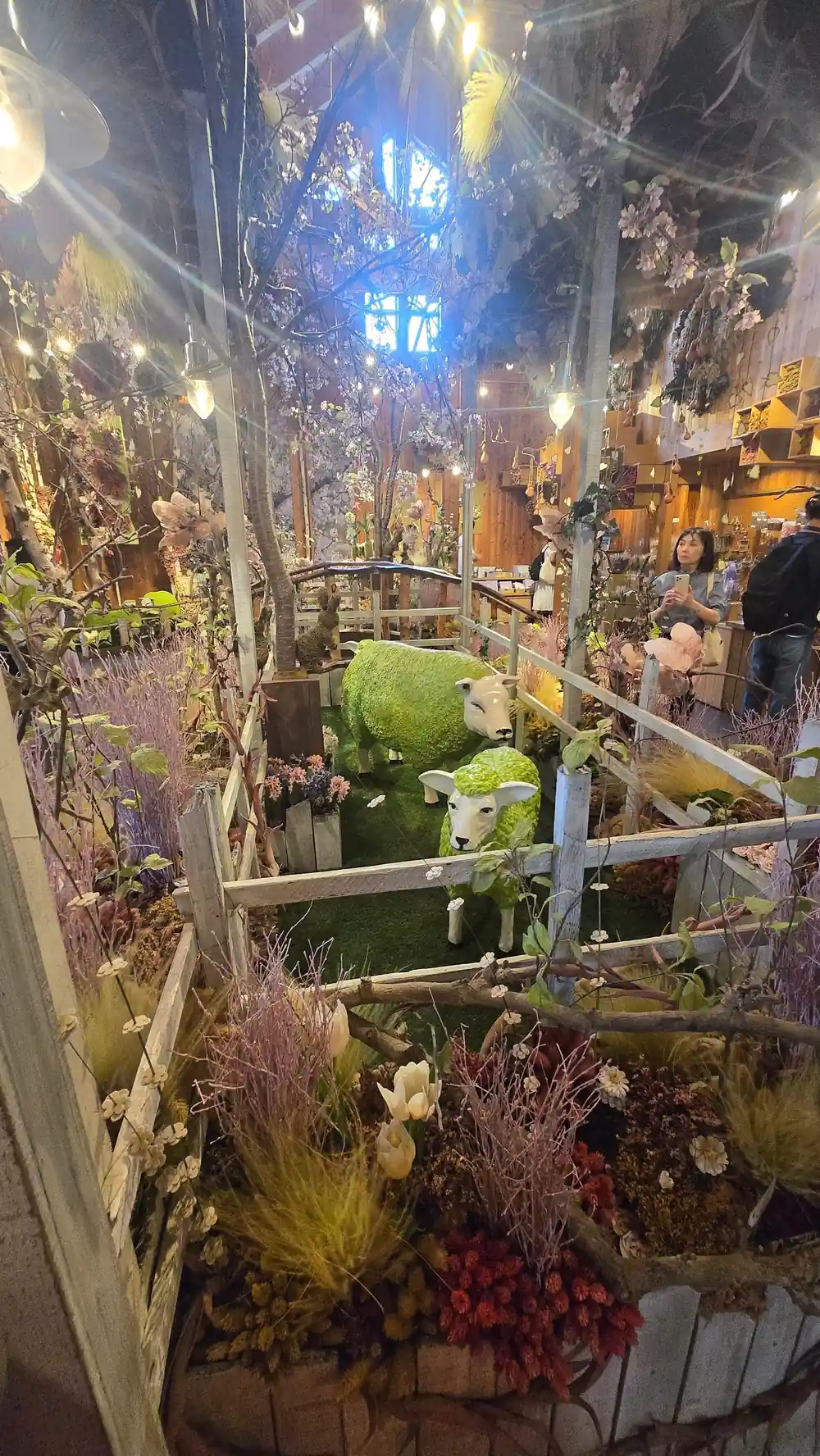 Night market flower stall with neon lights